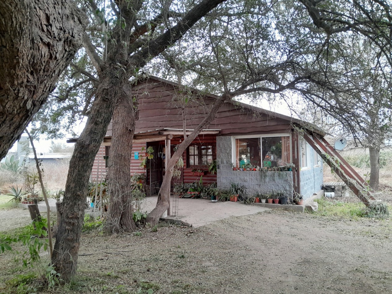 VENDO CASA TIPO CABAÑA EN 2 TERRENOS. ANISACATE. ESCRITURA!!!